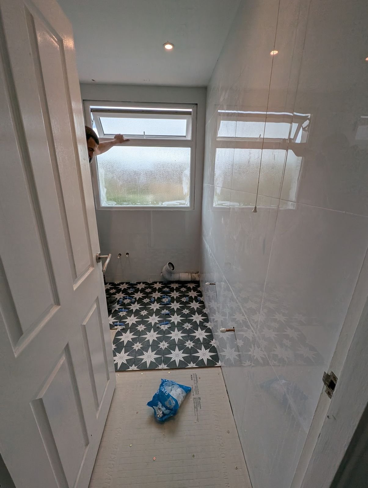 Star-pattern floor laid before the walls