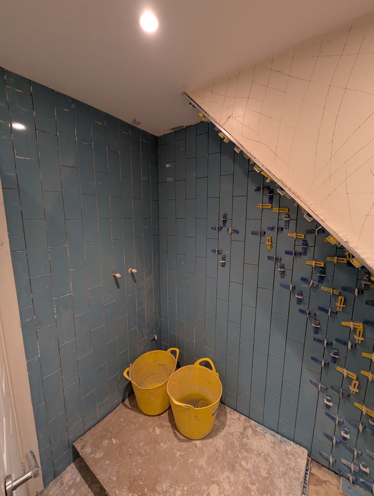 Blue metro tiles going up