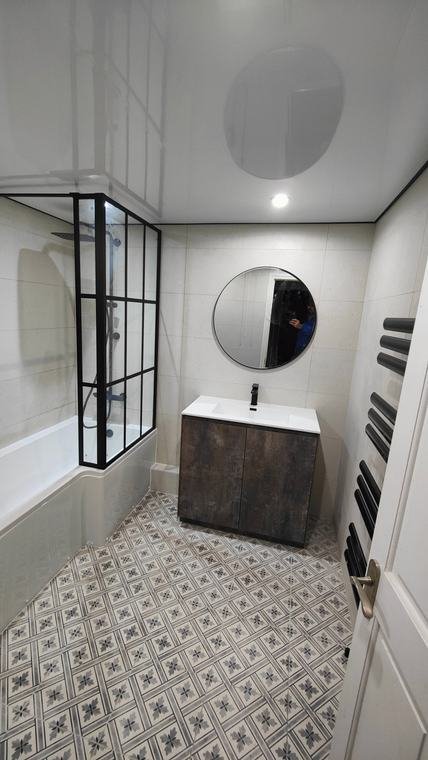 Patterned floor and black-framed screen