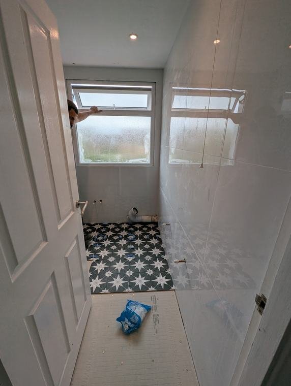Star-pattern floor laid before the walls