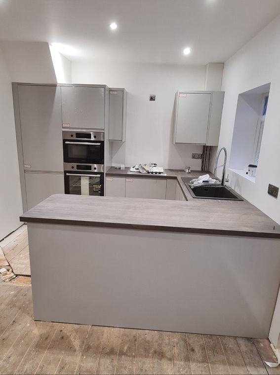 Light grey kitchen with island