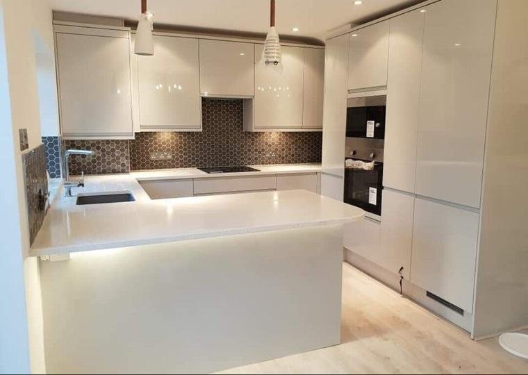 White gloss kitchen with island