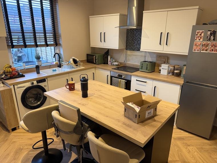Cream kitchen with an oak-effect island